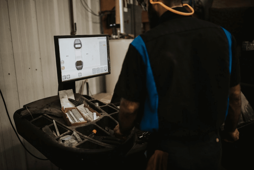 Auto repair near South Haven, MN by Arvu Auto. Image of a technician using a computerized alignment system with a vehicle diagnostic screen, ensuring precise adjustments for safe and reliable driving.