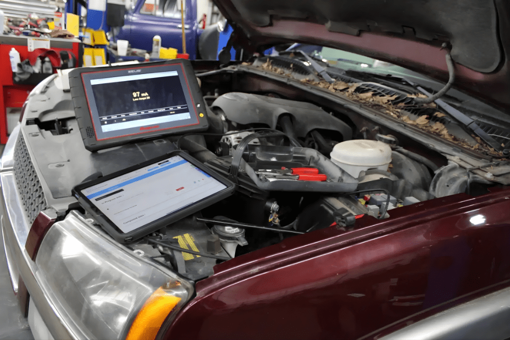 Auto repair near Fair Haven, MN. Image of a vehicle under testing with diagnostic scanners connected to the engine, highlighting accurate troubleshooting for performance and reliability.