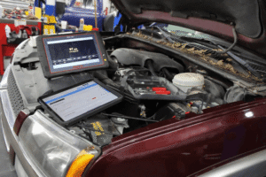 Check engine light, auto repair in Cokato, MN, at Arvu Auto. Image of advanced diagnostic scan tools connected to a vehicle during engine testing, highlighting accurate troubleshooting and expert diagnostics that restore performance, reliability, and driver confidence.